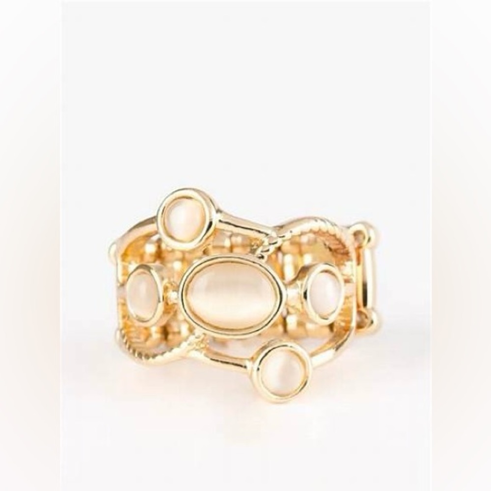 *Gold moonstone ring.